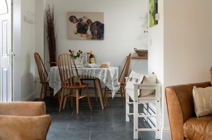 The dining table in the kitchen at The Milking Parlour, Wiltshire 