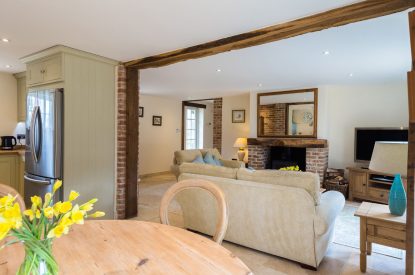 The dining room leading towards the living room at Brightwaters Stables, Hampshire