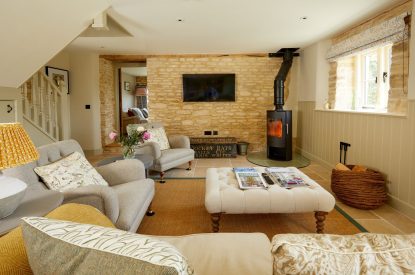 The living room at The Barn at Ampneyfield, Gloucestershire