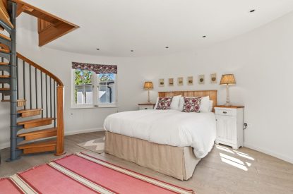 A super king sized bedroom at Little Haven, Gower