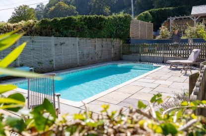 The outdoor swimming pool at Little Haven, Gower