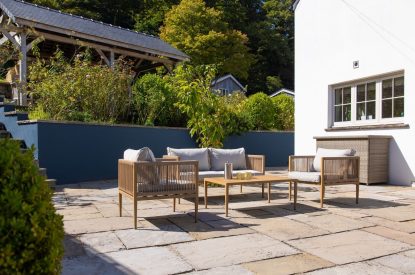 Outdoor seating area at Little Haven, Gower