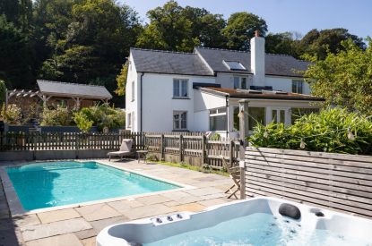 The hot tub and swimmimg pool at Little Haven, Gower