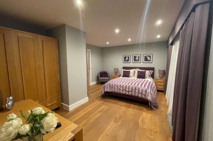 A king size bedroom at The Moorings, Cornwall