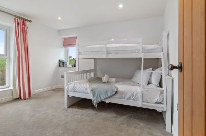 A bunk bedroom at Channel View, Oxwich