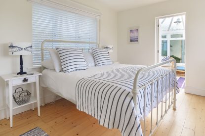 A king size bedroom at Y Wenffrwd, Abersoch