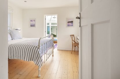 A king size bedroom at Y Wenffrwd, Abersoch