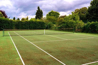 The tennis court at Cotswold Retreat, Cotswolds
