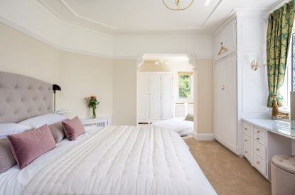 A king size bedroom at The Vineyard Lake House, Malvern Hills