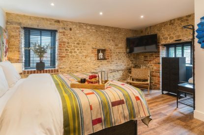 A super king size bedroom at Clay Hill House, Chapmanslade, Wiltshire