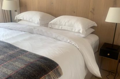 The super king size bedroom at Basket Makers Cottage, Roundstone, Galway
