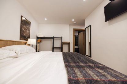 Super king size bedroom at Stone Mason's Cottage, Roundstone, Galway