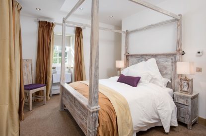 The four poster bed at Lomond House, Loch Lomond