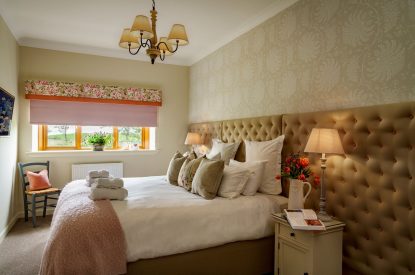 A super-king size bedroom at Macduff House, St Andrews