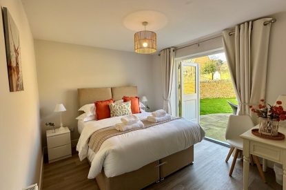 A double bedroom at Honey Stone Cottage, Cotswolds