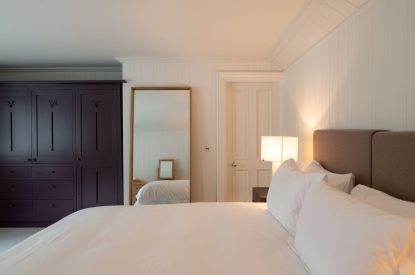 A super king size bedroom at Muirfield Green, East Lothian