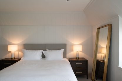 A super king size bedroom at Muirfield Green, East Lothian