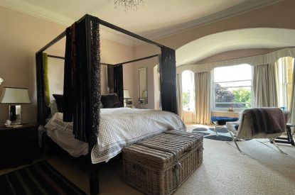 A four poster bedroom at Chulmleigh Manor, Devon