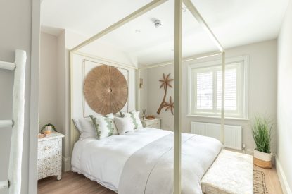 A king size bedroom at Coral House, Dorset