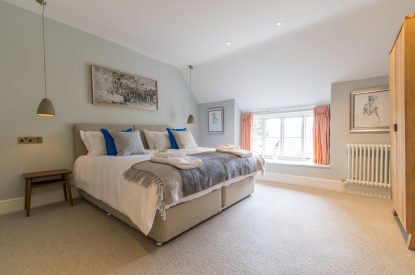 A super king sized bedroom at Hawthorn Farmhouse, Somerset