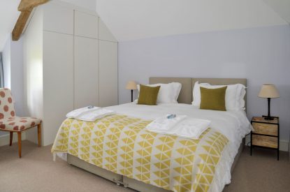 A super king sized bedroom at The Creamery, Somerset