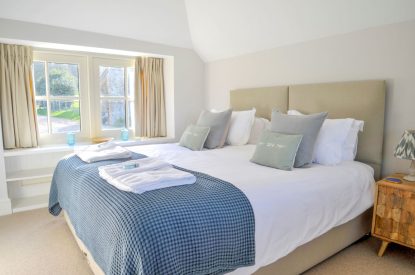 A super king sized bedroom at The Creamery, Somerset