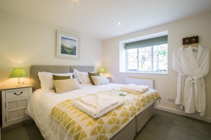 A super king sized bedroom at The Creamery, Somerset