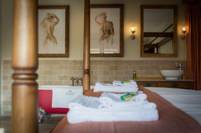 The four poster bed at Yew Tree Farmhouse, Somerset