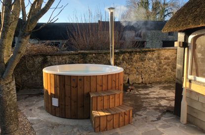 The wood fired hot tub at Yew Tree Farmhouse, Somerset