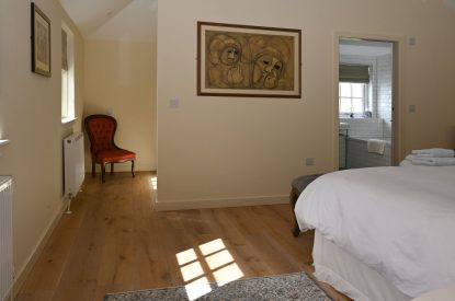 A king sized bedroom at Burnside Farmhouse, Perthshire