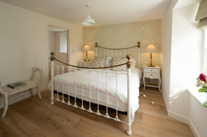 A king sized bedroom at Burnside Farmhouse, Perthshire