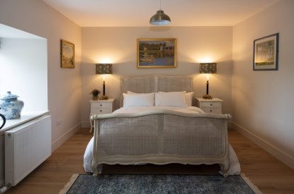 A king sized bedroom at Rowanrigg Steading, Perthshire