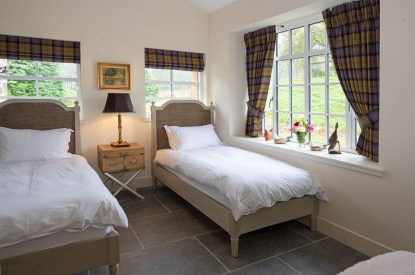 A twin bedroom at The Highland Croft, Perthshire