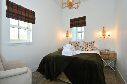 The king sized bedroom at The Wee Hoose, Perthshire