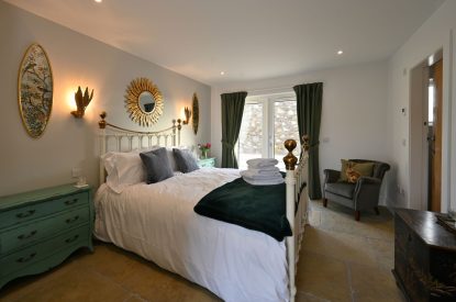 A king sized bedroom at Grousemoor Cottage, Perthshire