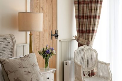 A king sized bedroom at Rowanrigg Steading, Perthshire