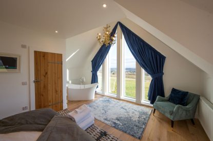The master bedroom at Bonnie Wren Cottage, Perthshire