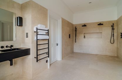 A shower room at White Exeter House, Devon