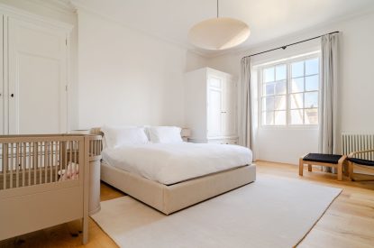 A super king size bedroom at White Exeter House, Devon