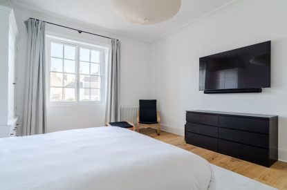 A super king size bedroom at White Exeter House, Devon