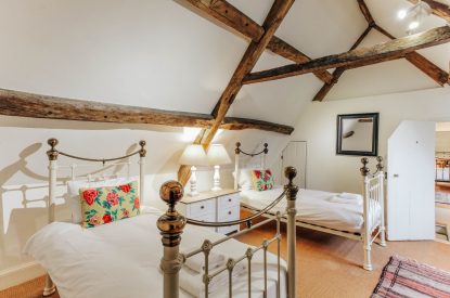A twin bedroom at Katsura House, Cotswolds