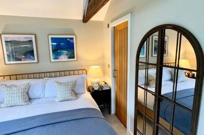 A super-king sized bedroom at Wheatsheaf Barn, Hampshire