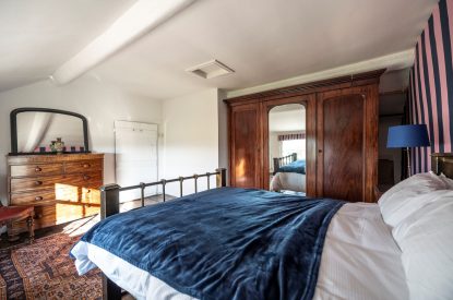 A king size bedroom at Mihangel House, Denbighshire 