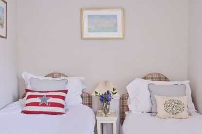 A twin bedroom at Hockham House, Norfolk Coast