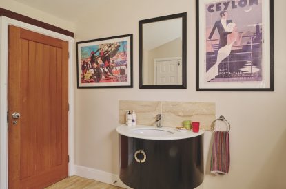A shower room at Hockham Pool House, Norfolk Coast