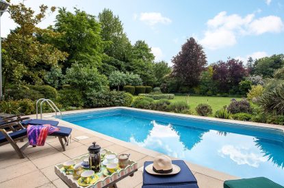The heated outdoor swimming pool at Hockham Pool House, Norfolk Coast