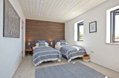 A twin bedroom at Seascape House, Cornwall