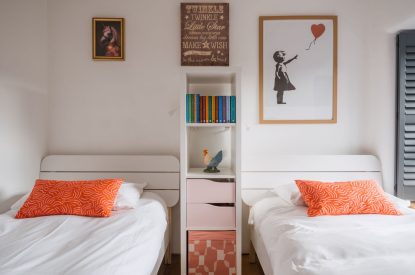 A twin bedroom at Wisteria Farmhouse, Cornwall