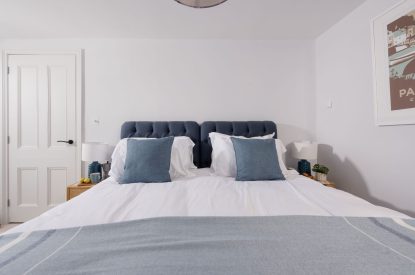 A super king-size bedroom at Watergate House, Cornwall