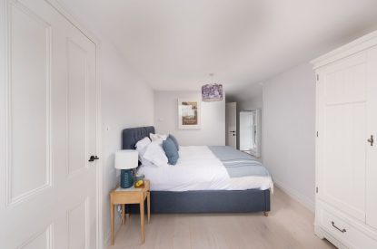 A super king-size bedroom at Watergate House, Cornwall